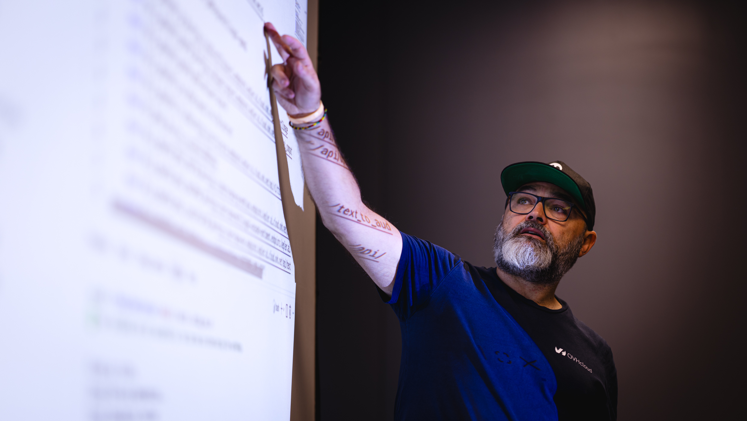 Stéphane Philippart, OVHcloud Developer Advocate, points out projected code at Devoxx Belgium